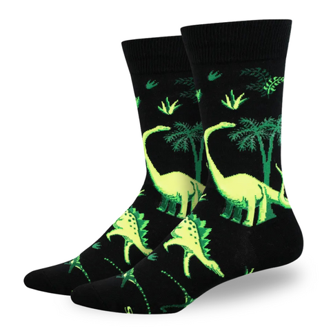 Black socks with green dinosaur pattern.