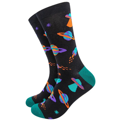 Black socks with colorful space-themed designs on a white background
